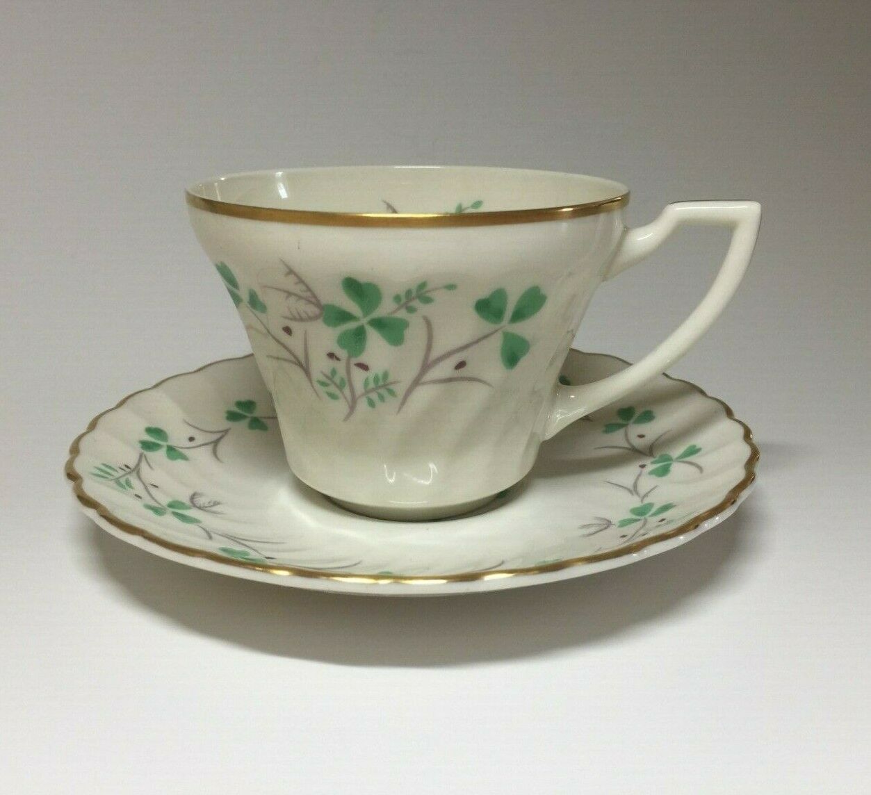 Syracuse China Clover Shamrocks Gold Trim Porcelain Swirl Tea Cup & Saucer
